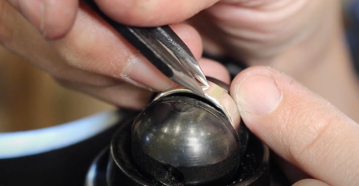 Marking the centre point on the piece with calipers
